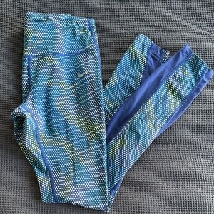 Nike Dri-Fit running tights with mesh paneling